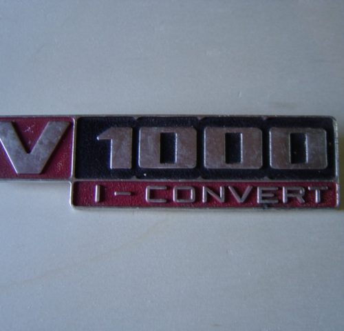 ANAGRAMA METÁLICO CONVERT V-1000